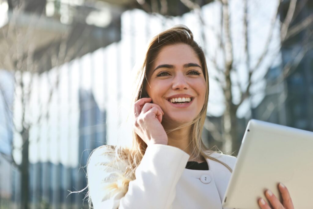 Woman looking very happy because she says affirmations daily